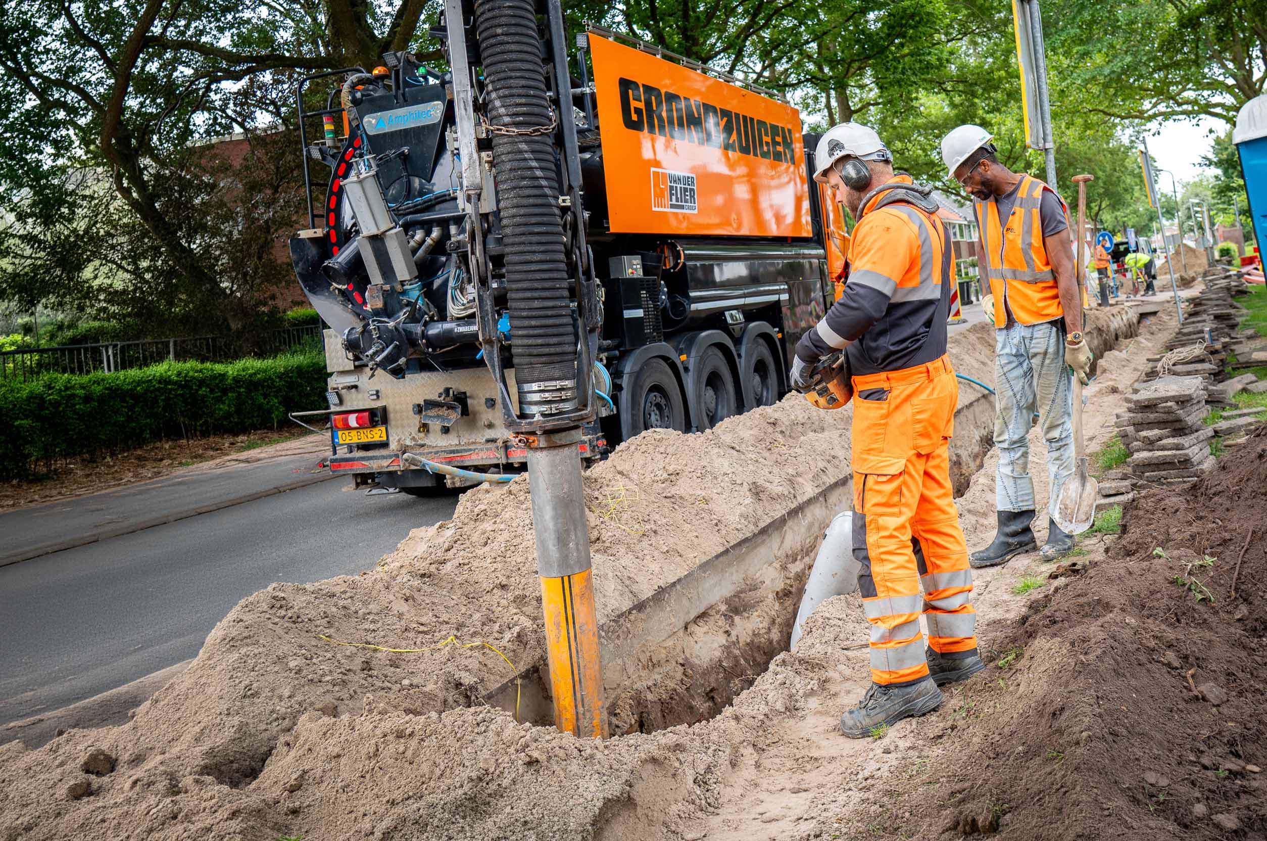 Live demonstratie grondzuigen bij een sleuf
